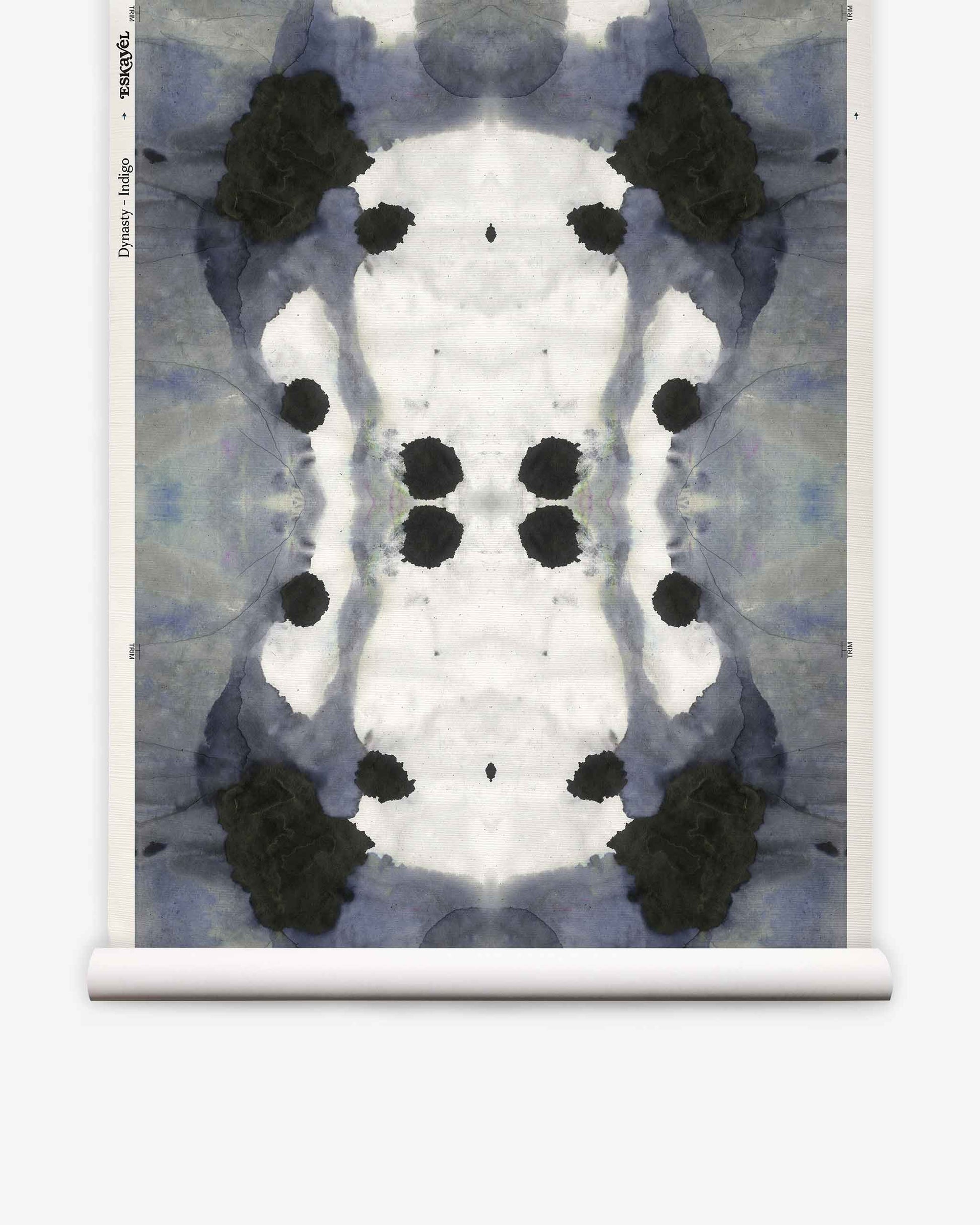 Dynasty Grasscloth||Indigo features a symmetrical abstract inkblot pattern in black, gray, and indigo blue, displayed on a vertical scroll against a white background—an eye-catching design perfect as an abstract wallpaper or a striking statement indigo wallpaper.
