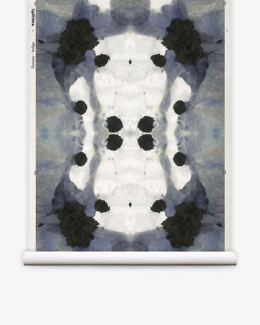 Dynasty Grasscloth||Indigo features a symmetrical abstract inkblot pattern in black, gray, and indigo blue, displayed on a vertical scroll against a white background—an eye-catching design perfect as an abstract wallpaper or a striking statement indigo wallpaper.