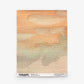 A square sheet of Empyrean Grasscloth Sample||Sol features textured paper with horizontal, watercolor-like streaks in orange, green, and beige tones. The bottom edge includes small printed text. Order an Empyrean Grasscloth Sample||Sol to experience its unique finish and vibrant color detail firsthand.