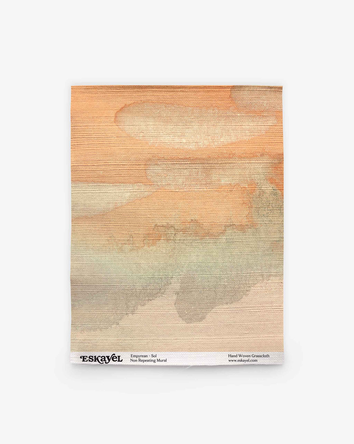A square sheet of Empyrean Grasscloth Sample||Sol features textured paper with horizontal, watercolor-like streaks in orange, green, and beige tones. The bottom edge includes small printed text. Order an Empyrean Grasscloth Sample||Sol to experience its unique finish and vibrant color detail firsthand.