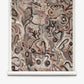 Floripa Grasscloth||Bay wallpaper features swirling, organic shapes and patterns in earthy tones—browns, blacks, and whites—that capture the rhythmic energy of surf culture. Layered brushstrokes and graphic lines flow across the vertical canvas, reminiscent of windswept shores and dynamic island landscapes.
