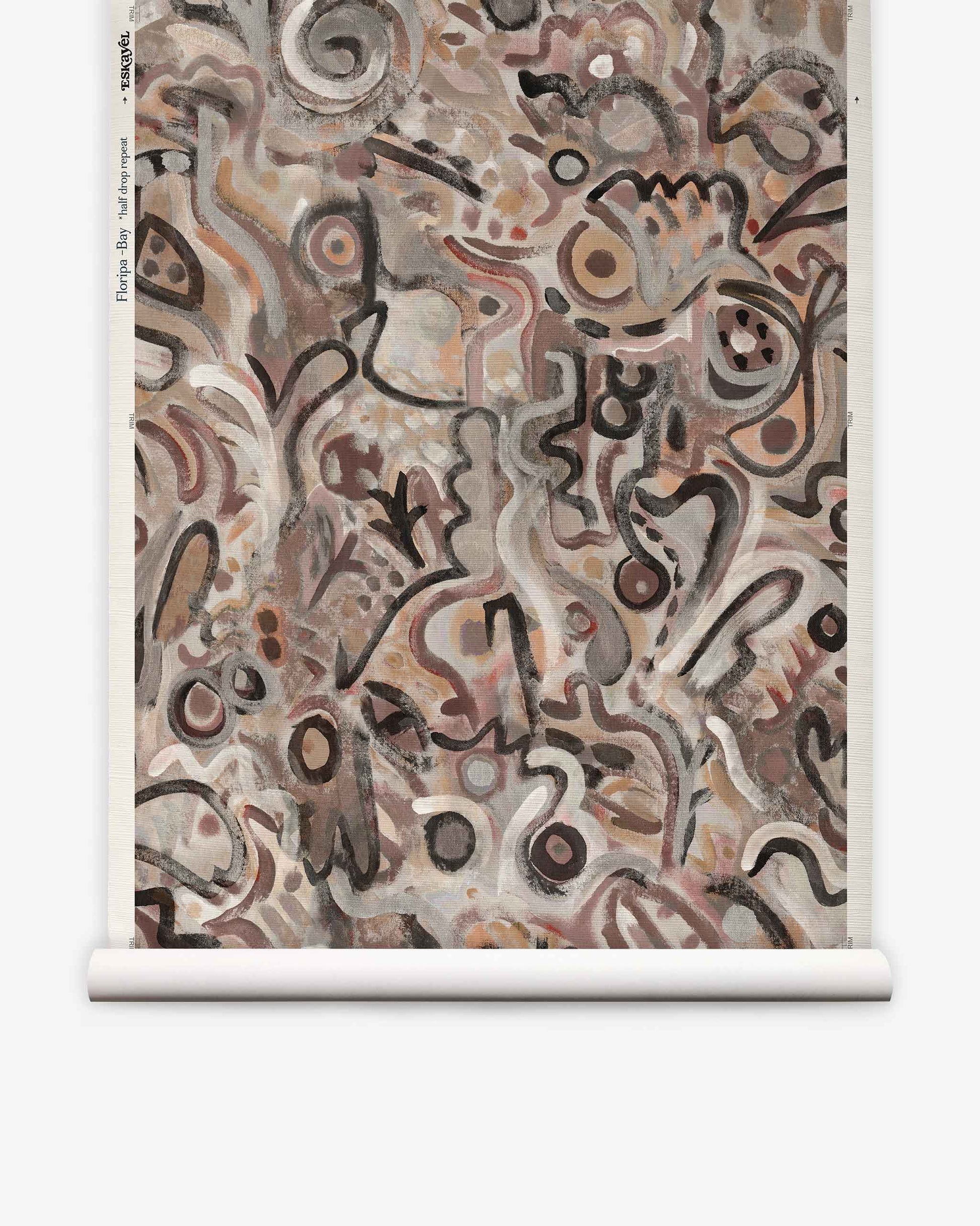 Floripa Grasscloth||Bay wallpaper features swirling, organic shapes and patterns in earthy tones—browns, blacks, and whites—that capture the rhythmic energy of surf culture. Layered brushstrokes and graphic lines flow across the vertical canvas, reminiscent of windswept shores and dynamic island landscapes.