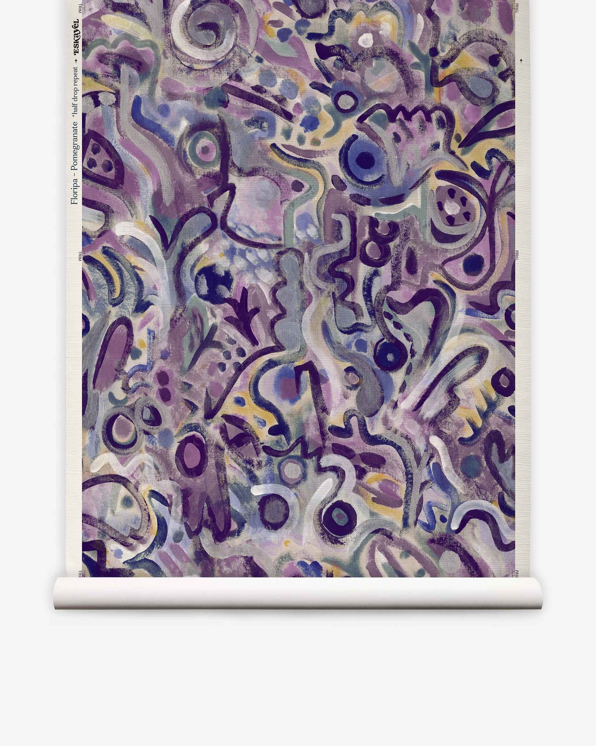 Floripa Grasscloth||Pomegranate features an abstract design with swirling purple, blue, and gray shapes and patterns displayed on a crisp white scroll. Various curved lines and forms create a textured, layered composition reminiscent of luxury wallpaper—perfect for spaces inspired by surf culture or an Eskayel collaboration aesthetic.