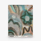 Abstract patterned fabric swatch showcasing teal, brown, black, and beige brushstrokes and shapes—evoking the lively multicolor style of wallpaper designs such as the Floripa Grasscloth||Reef—displayed against a white background with visible text along the bottom edge.