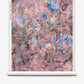 Inflorescence Grasscloth||Reef features abstract pink, purple, and blue marbled patterns on a white scroll with a cylindrical base, resembling watercolor wallpaper.