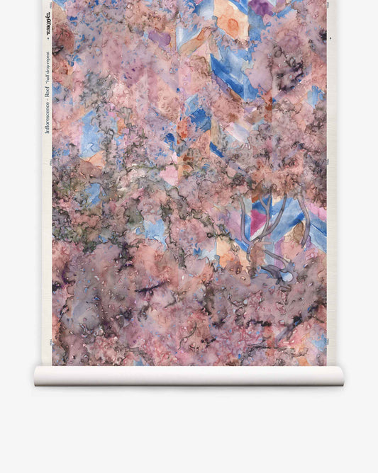 Inflorescence Grasscloth||Reef features abstract pink, purple, and blue marbled patterns on a white scroll with a cylindrical base, resembling watercolor wallpaper.