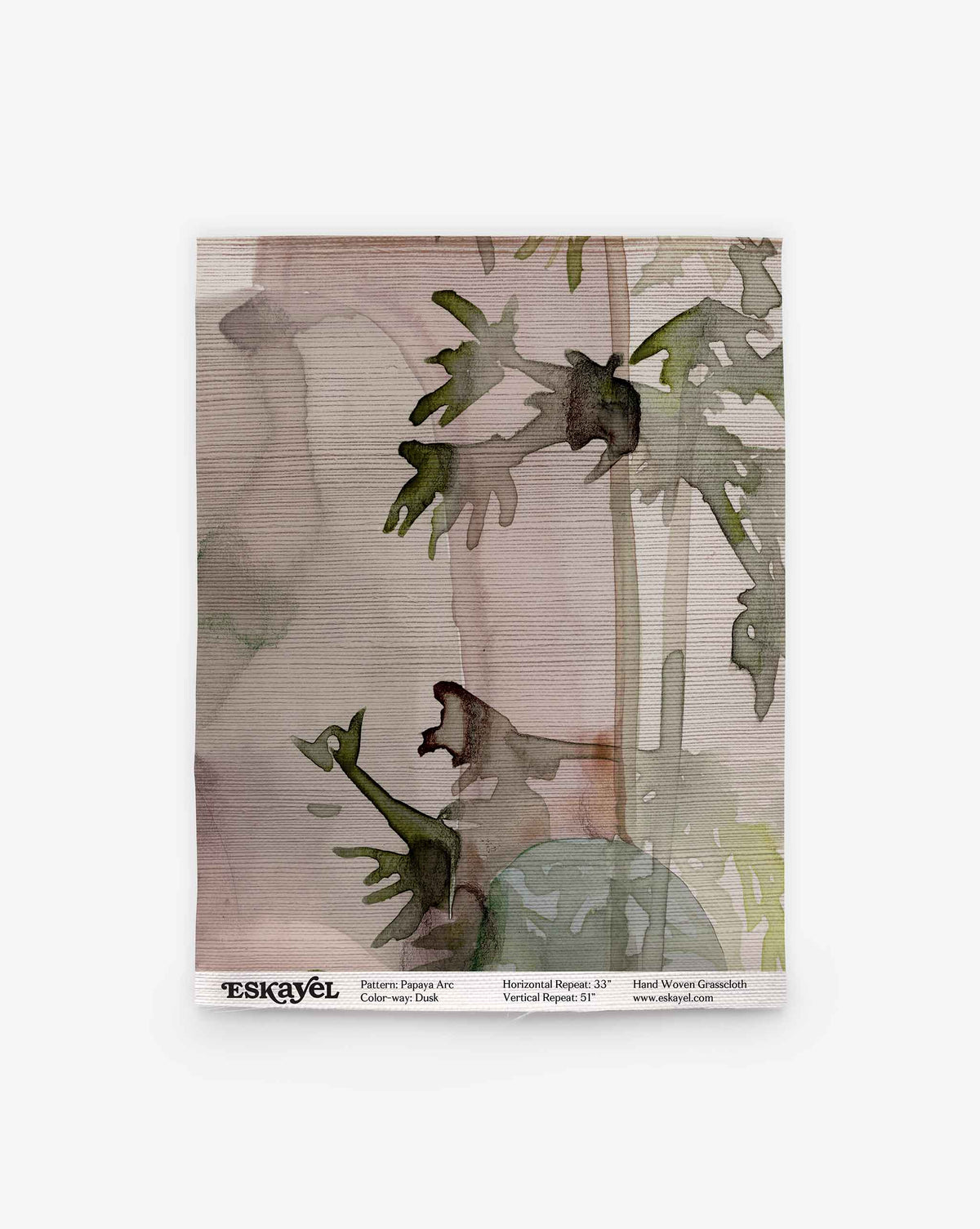 A rectangular Papaya Arc Grasscloth Sample in Dusk featuring a watercolor painting of green papaya leaves against a light purple and beige striped background.