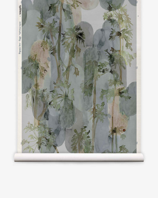 Papaya Arc Grasscloth in Sage featuring a hand-woven grasscloth wallpaper with a watercolor pattern of green papaya trees set against vertical grey arch shapes.