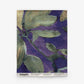 Square swatch of fabric featuring the Plumeria Shadows Grasscloth pattern in Eggplant, with abstract floral designs in green and purple hues. The bottom edge is marked with “ESKAYEL” and includes pattern and dimension details. Perfect for exploring your next project—Order a sample to experience the unique texture and vibrant colors firsthand.