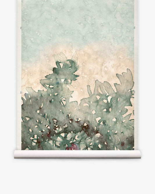 Prospect Grasscloth Mural||Verde features a watercolor depiction of green foliage set against a pale blue and beige sky, displayed on a white hanging scroll—an ideal choice as a wall mural to infuse any space with fresh, natural beauty.