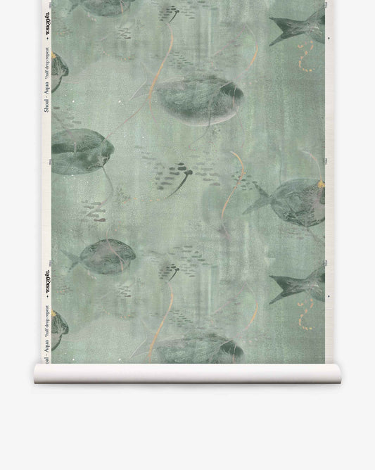 Shoal Grasscloth||Aqua is a wallpaper roll featuring illustrated stingrays, fish, and aquatic plants on a muted green background, bringing serene elegance to any space with its aquatic-inspired design.