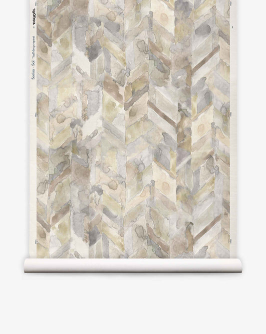 Sorisa Grasscloth||Sol shown vertically against a white background features a chevron pattern in muted beige, gray, and taupe watercolor tones.
