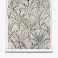 Travelers Palm Grasscloth||Dusk hand-woven wallpaper featuring a watercolor pattern of palm leaves over a faint, scalloped grid in shades of green and purple on a neutral biophilic background.
