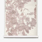 A roll of Up for Anything Grasscloth||Glimmer wallpaper features an Eskayel-inspired abstract botanical pattern in muted pink and beige tones on a light background.