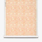 Yaya grasscloth wallpaper in Grapefruit on a roll — beach-themed graphic botanical fabric in pale peach with light yellow highlights | Eskayel
