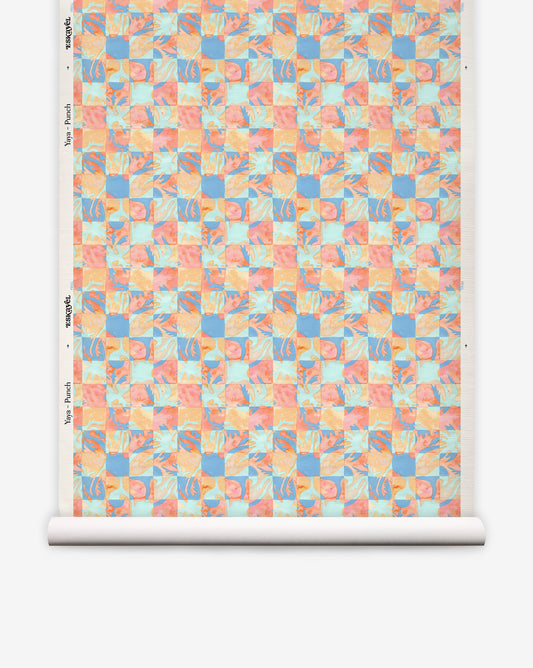 A roll of Yaya Grasscloth||Punch coastal aquarelle wallpaper featuring a checkered pattern of abstract shapes in shades of pink, orange, and blue.