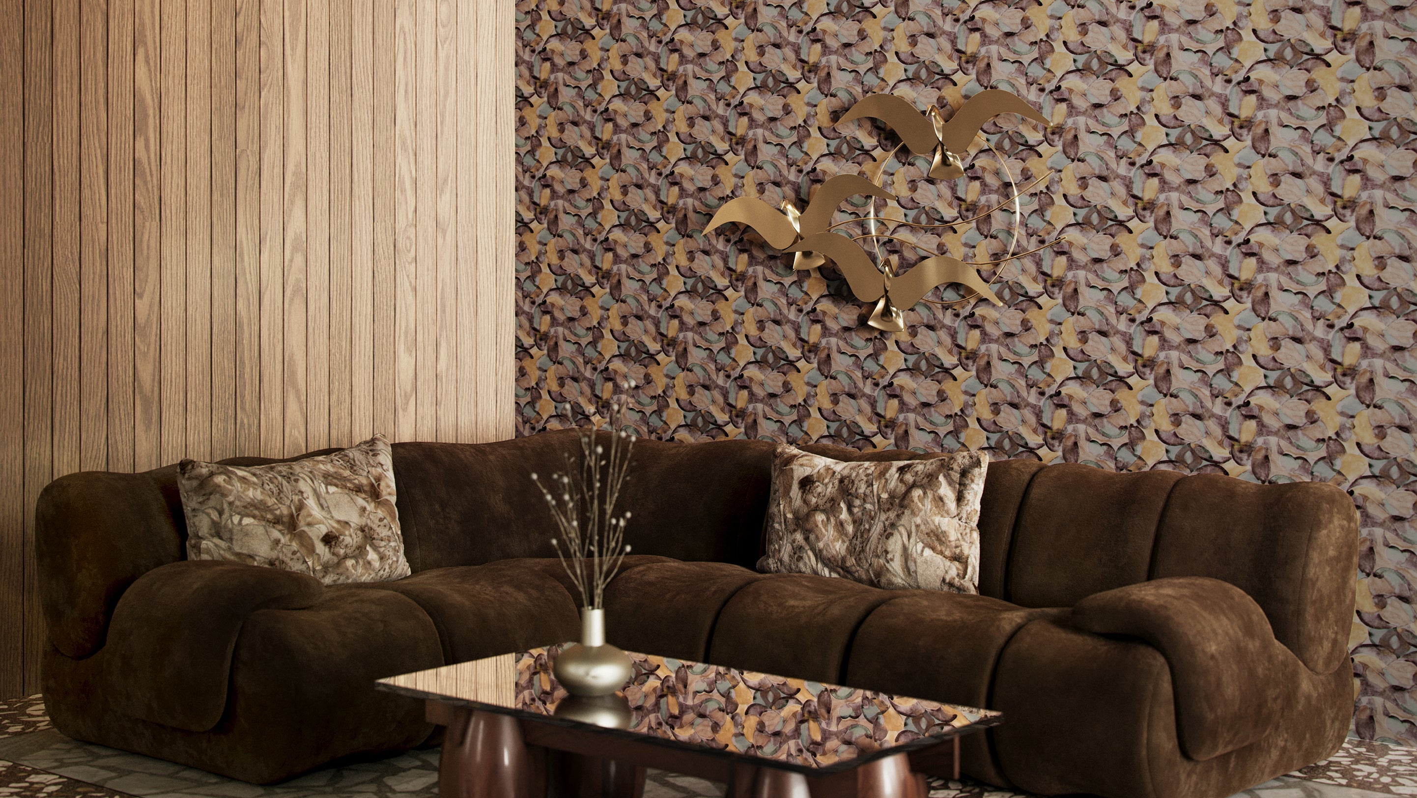 A couch, coffee table, and wall decor in a room with the orbs wallpaper in pebble.
