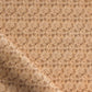 Eskayel’s Alhelí, a tiny repeating pattern for fabric, in the beige-based colorway Frangipani.
