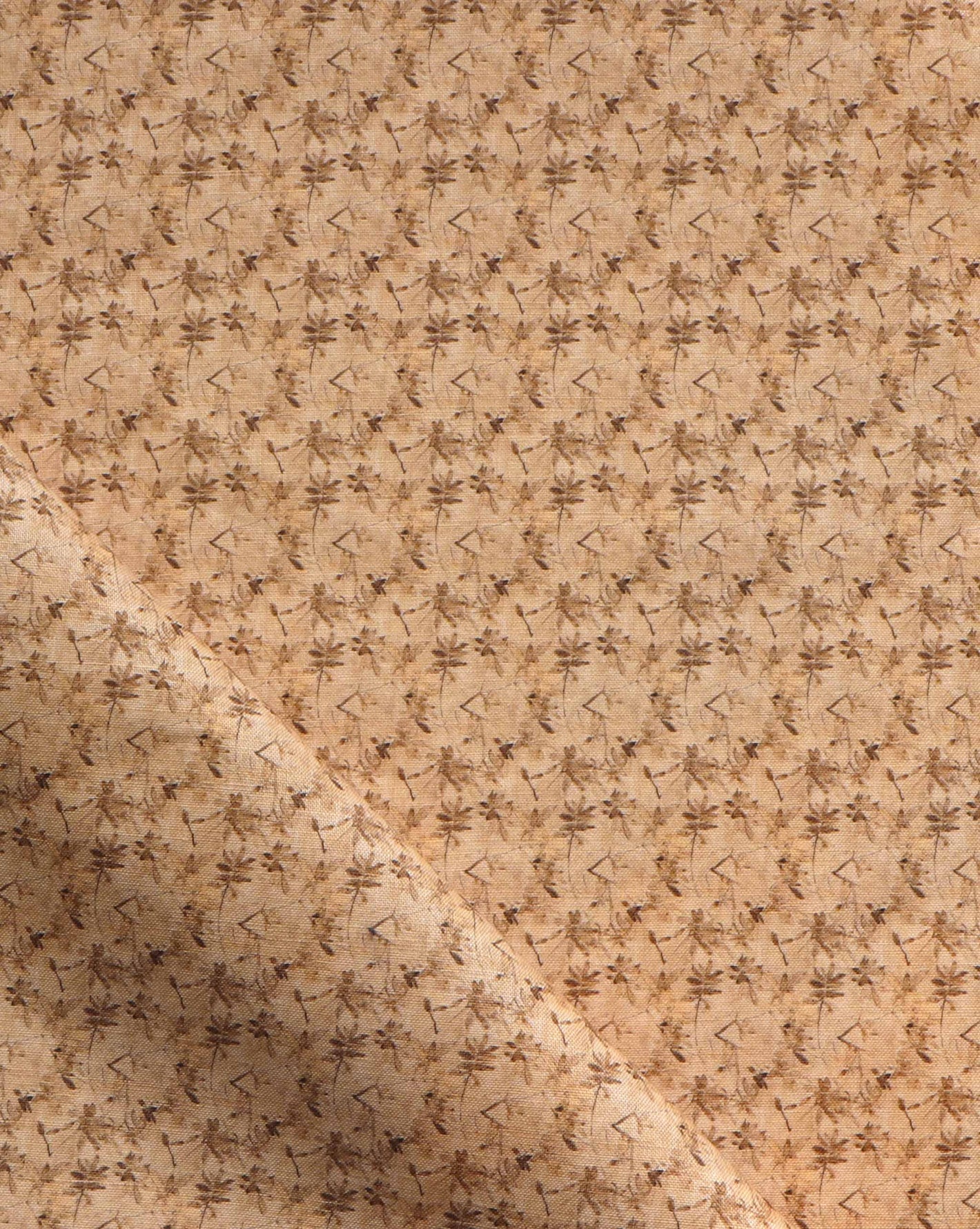 Alhelí Fabric Frangipani — hand-painted design with a tiny repeating pattern inspired by branches and leaves casting stark shadows on a stone patio in the strong light of the Costa Rican sun in a beige-based palette | Eskayel