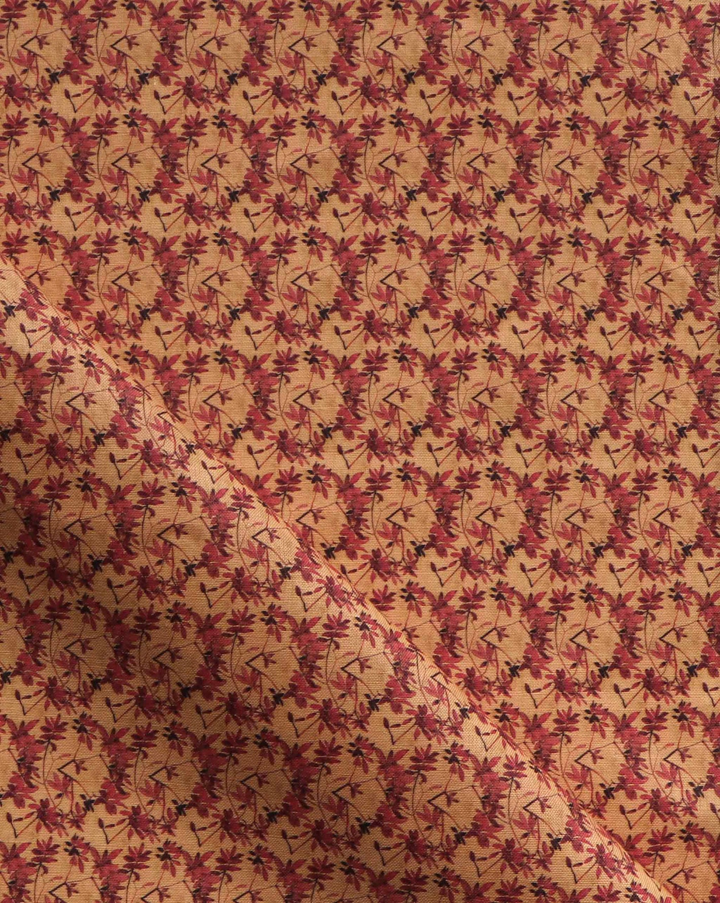 Alhelí Fabric Golden Hour — hand-painted design with a tiny repeating pattern inspired by branches and leaves casting stark shadows on a stone patio in the strong light of the Costa Rican sun in an orange-based  palette | Eskayel