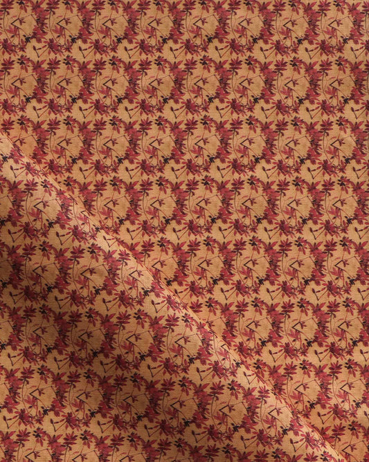 Eskayel’s Alhelí, a tiny repeating pattern for fabric, in the orange-based colorway Golden Hour.