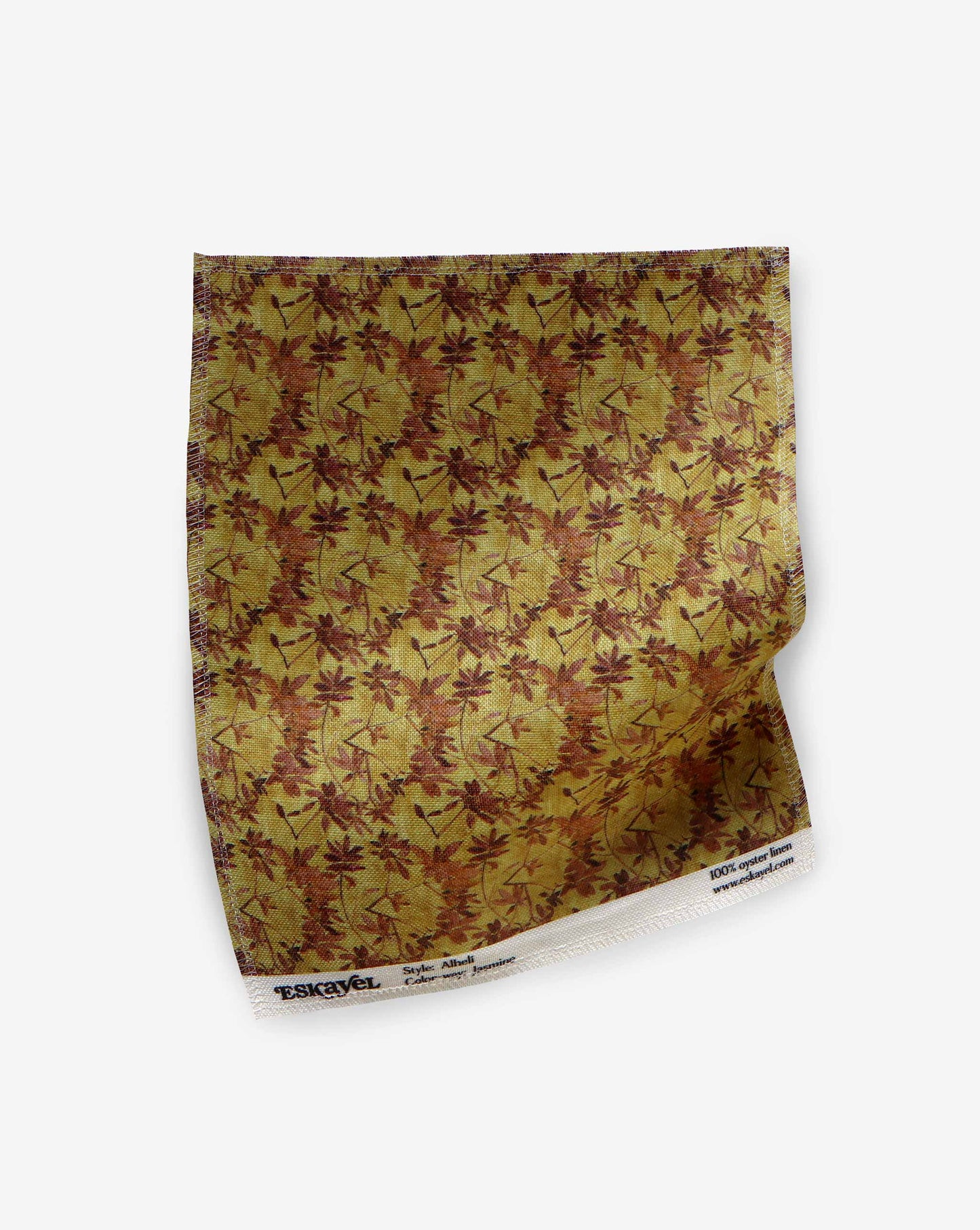 A swatch of Eskayel’s Alhelí, a tiny repeating pattern for fabric, in the green-based colorway Jasmine.