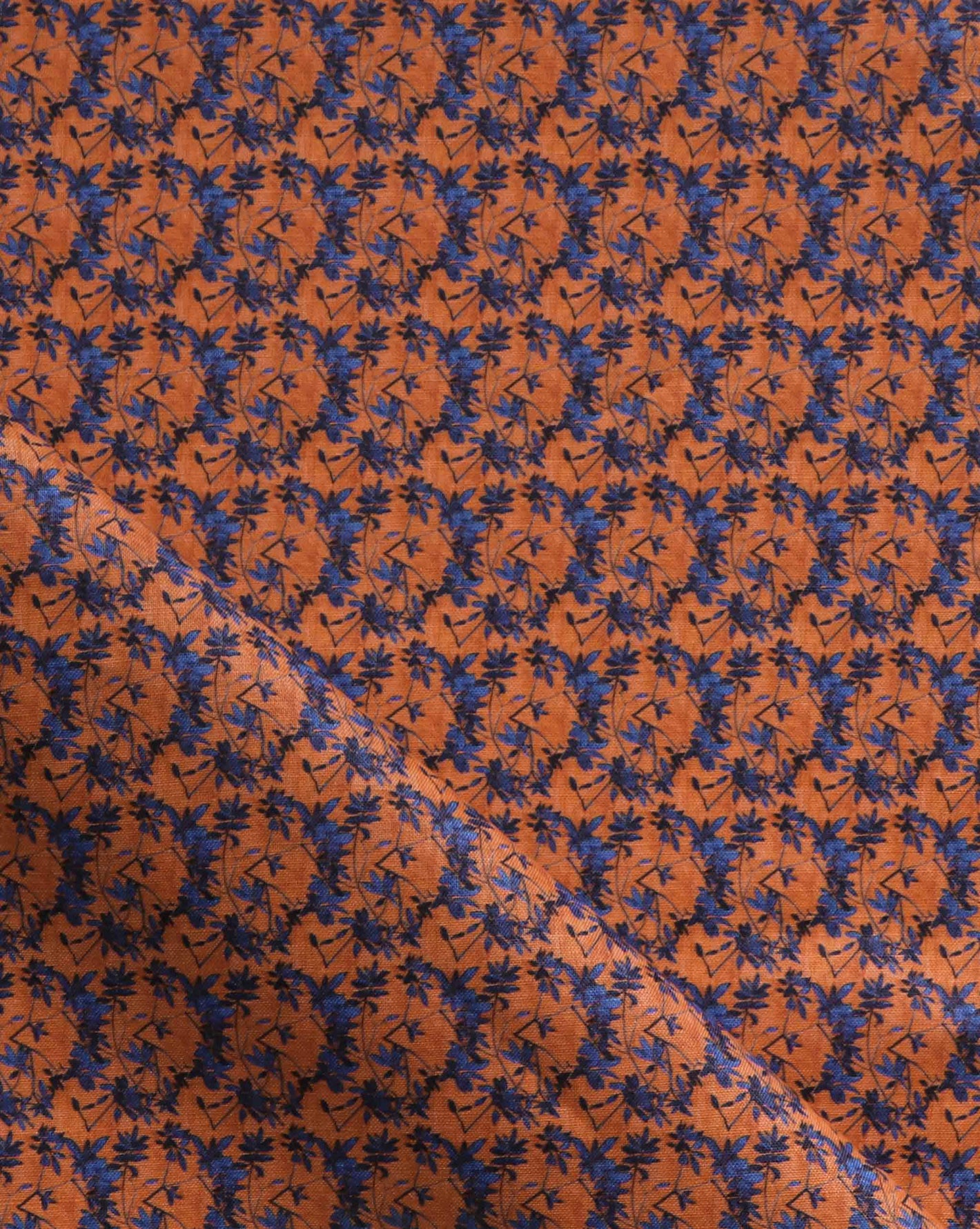 Alhelí, a tiny repeating hand-painted pattern for fabric, in the red-based Lobelia colorway | Eskayel