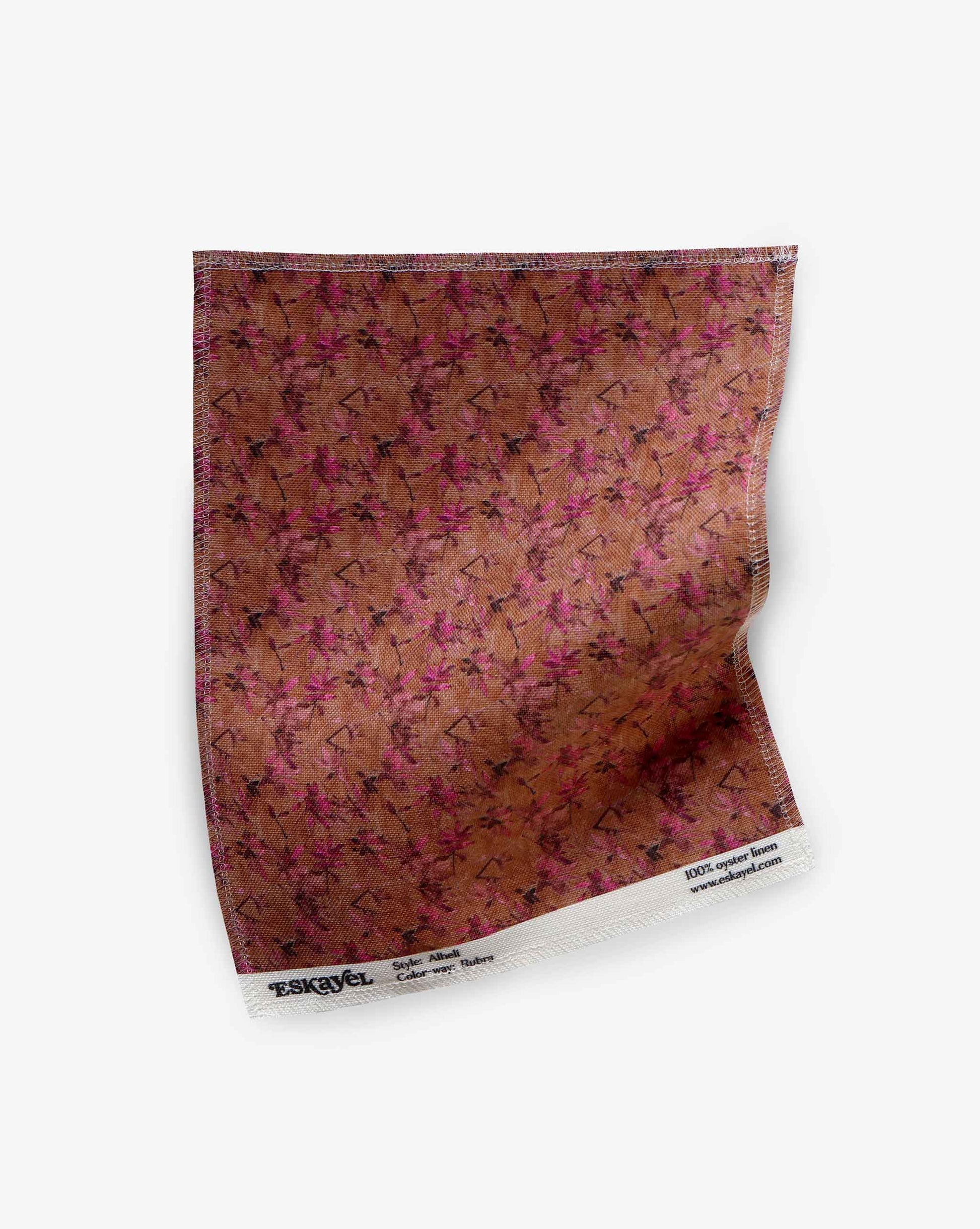 A swatch of Eskayel’s Alhelí, a tiny repeating pattern for fabric in the brown-based Rubra colorway. 