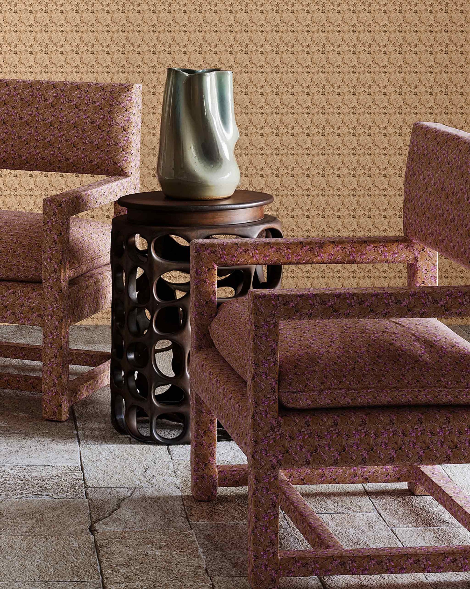 Upholstered chairs using Eskayel’s Alhelí, a tiny repeating pattern for fabric inspired by tropical living, in the brown-based Rubra colorway.