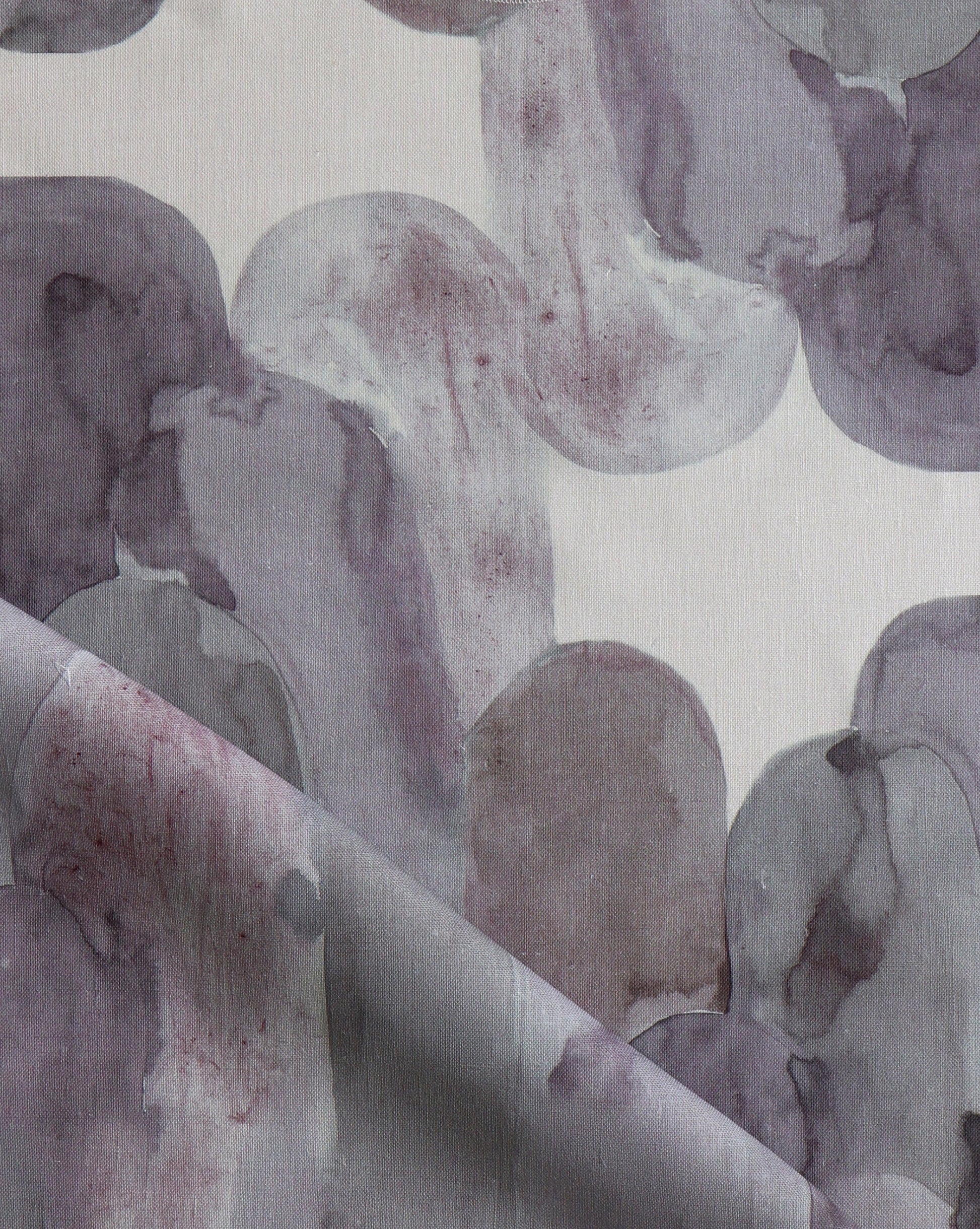 Luxurious Acros fabric in Pomegranate introduces magentas and greys into a soft geometric pattern of curves and columns