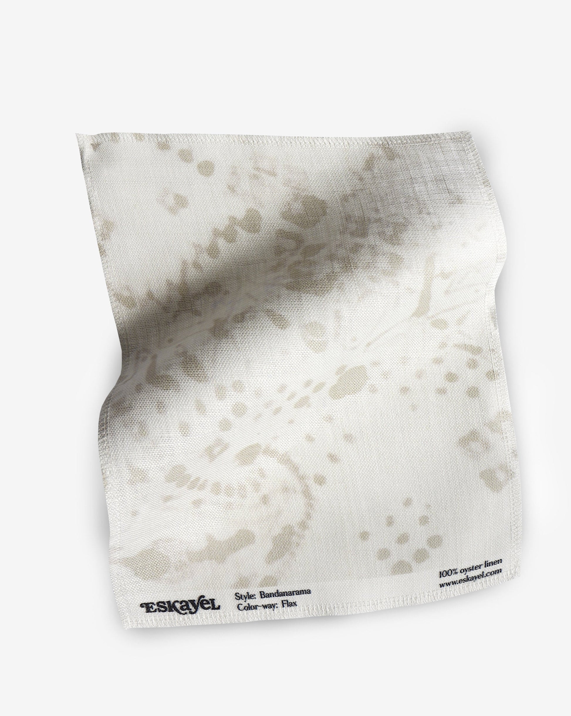 A fabric with our bandanarama pattern featuring a traditional bandana design in beige and white.