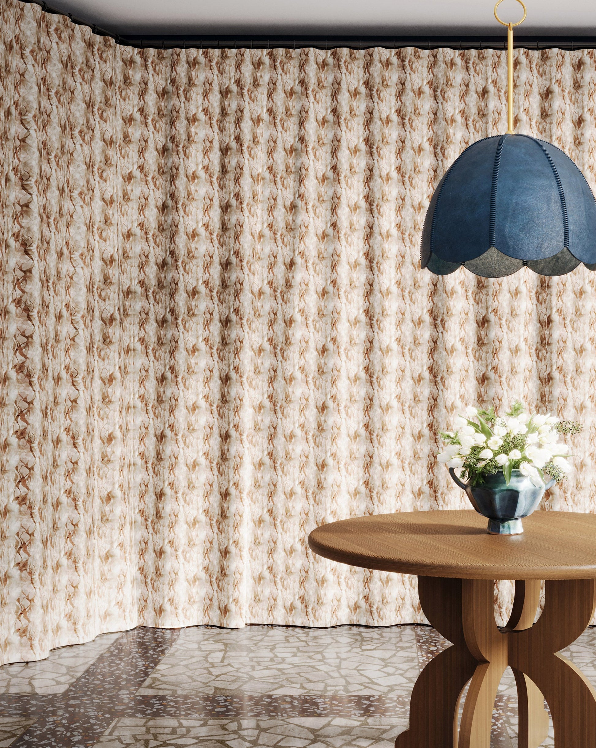 Cascade Garnet fabric in a brown and beige toned pattern used as curtains in a dining room.