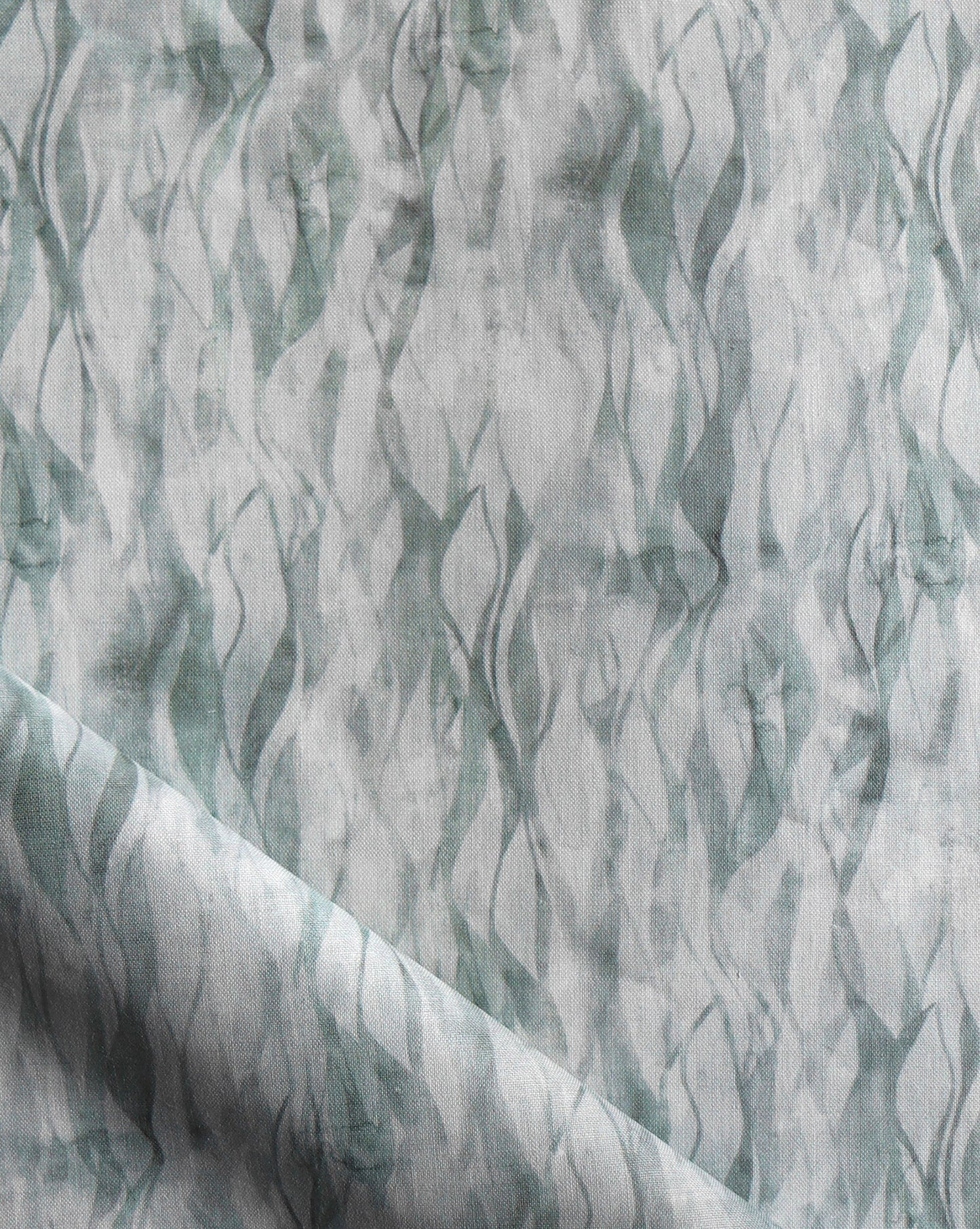 Eskayel’s Cascade fabric pattern in the Tourmaline colorway incorporates green shades.