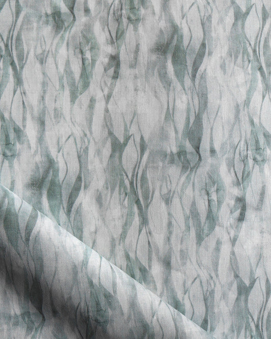 Eskayel’s Cascade fabric pattern in the Tourmaline colorway incorporates green shades.
