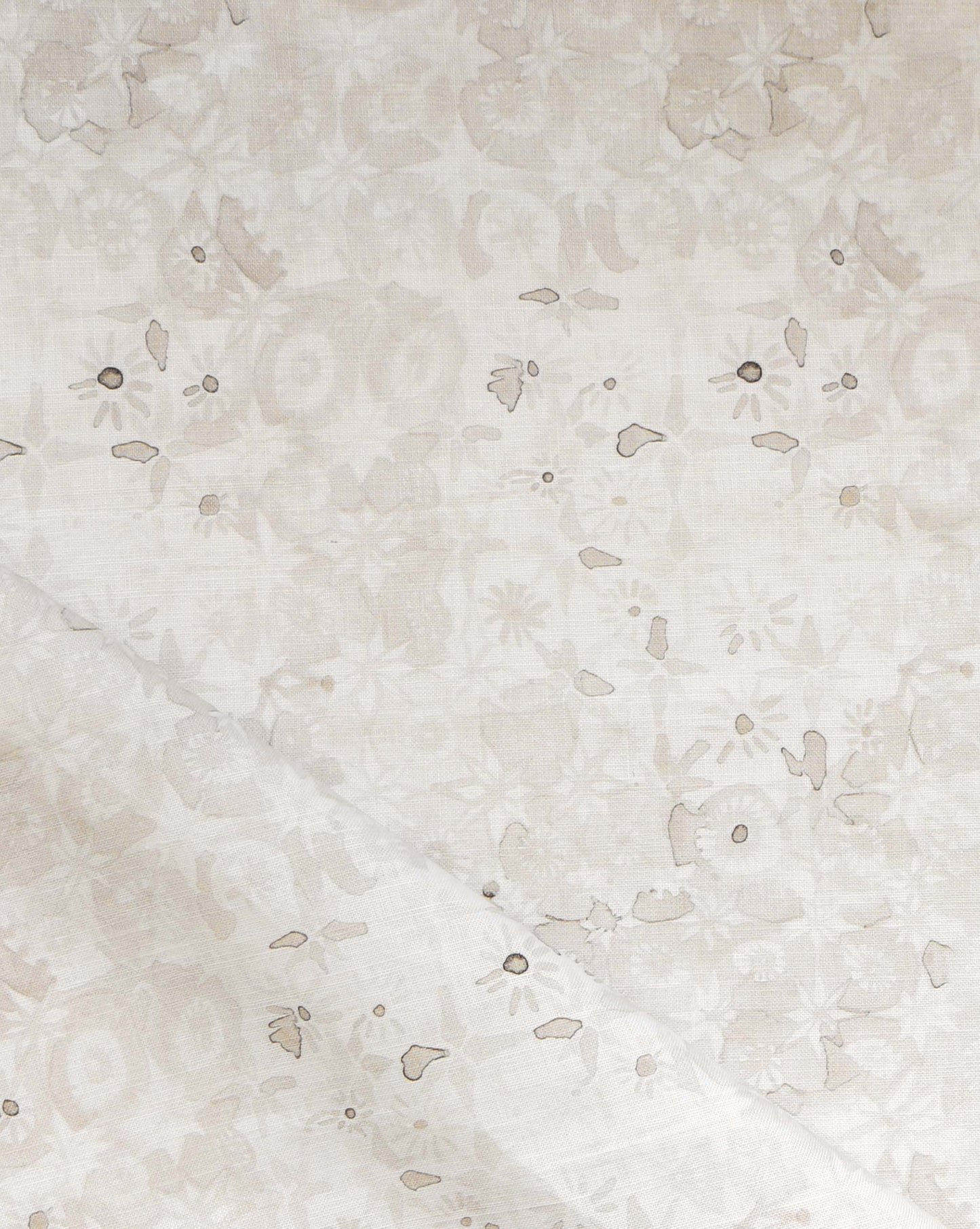 Eskayel’s Crochet Lace fabric in Ricotta is a micro-print of flowers in a cream palette.