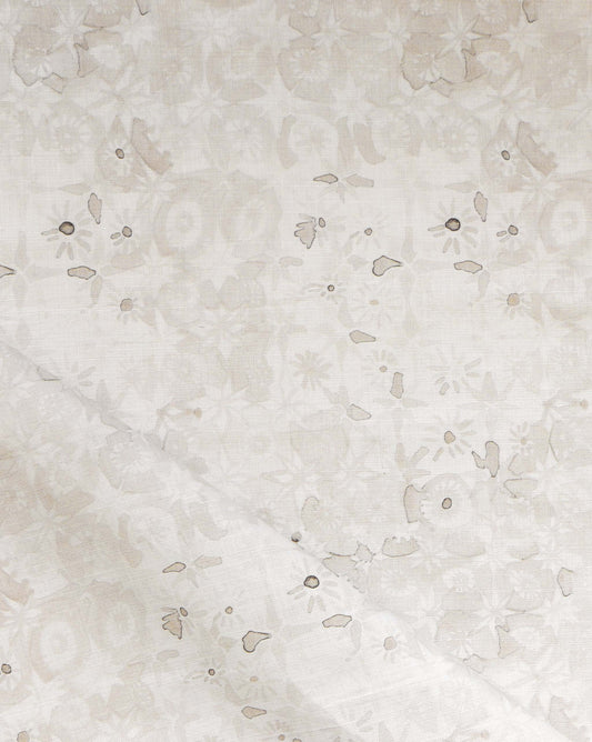 Eskayel’s Crochet Lace fabric in Ricotta is a micro-print of flowers in a cream palette.