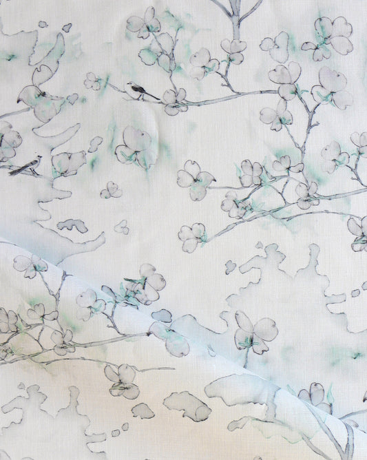As luxury fabric, Dogwood Dreams in Spruce provides a palette of greens, blues, and pinks.