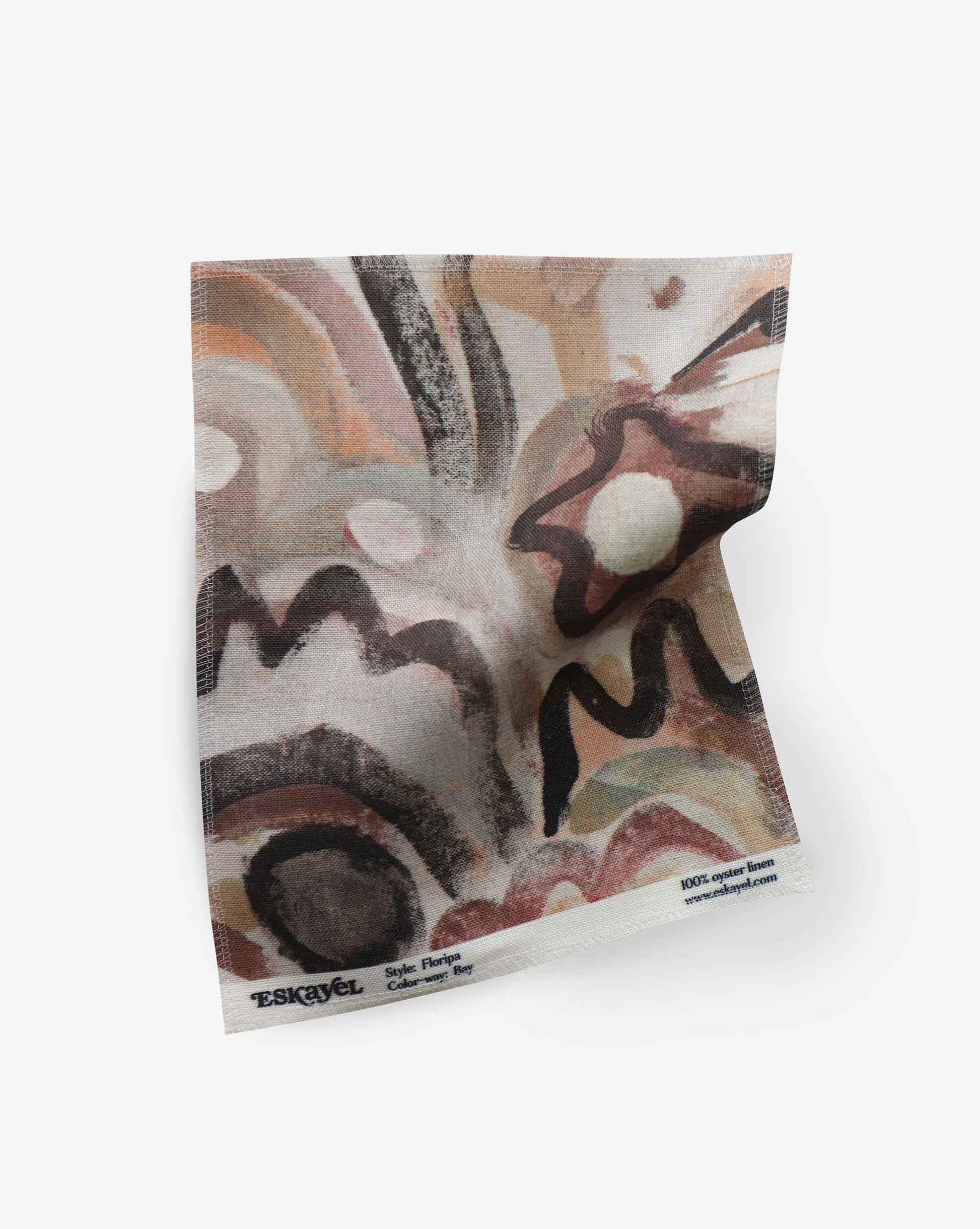A fabric swatch with our Floripa pattern in Bay featuring a design inspired by the beautiful tropical island of Florianopolis in Brazil that provides a colorway of brown tones.