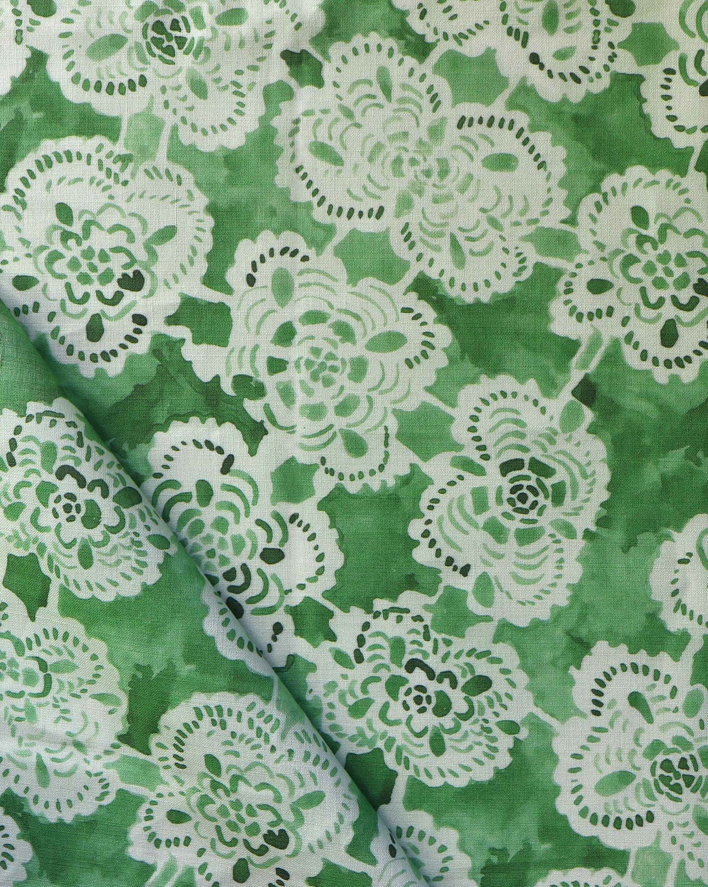Eskayel’s Margherita fabric in leafy Arugula presents floral shapes in a loose lattice.