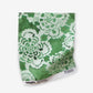 Eskayel’s Margherita fabric swatch in Arugula has  floral shapes in a loose lattice.