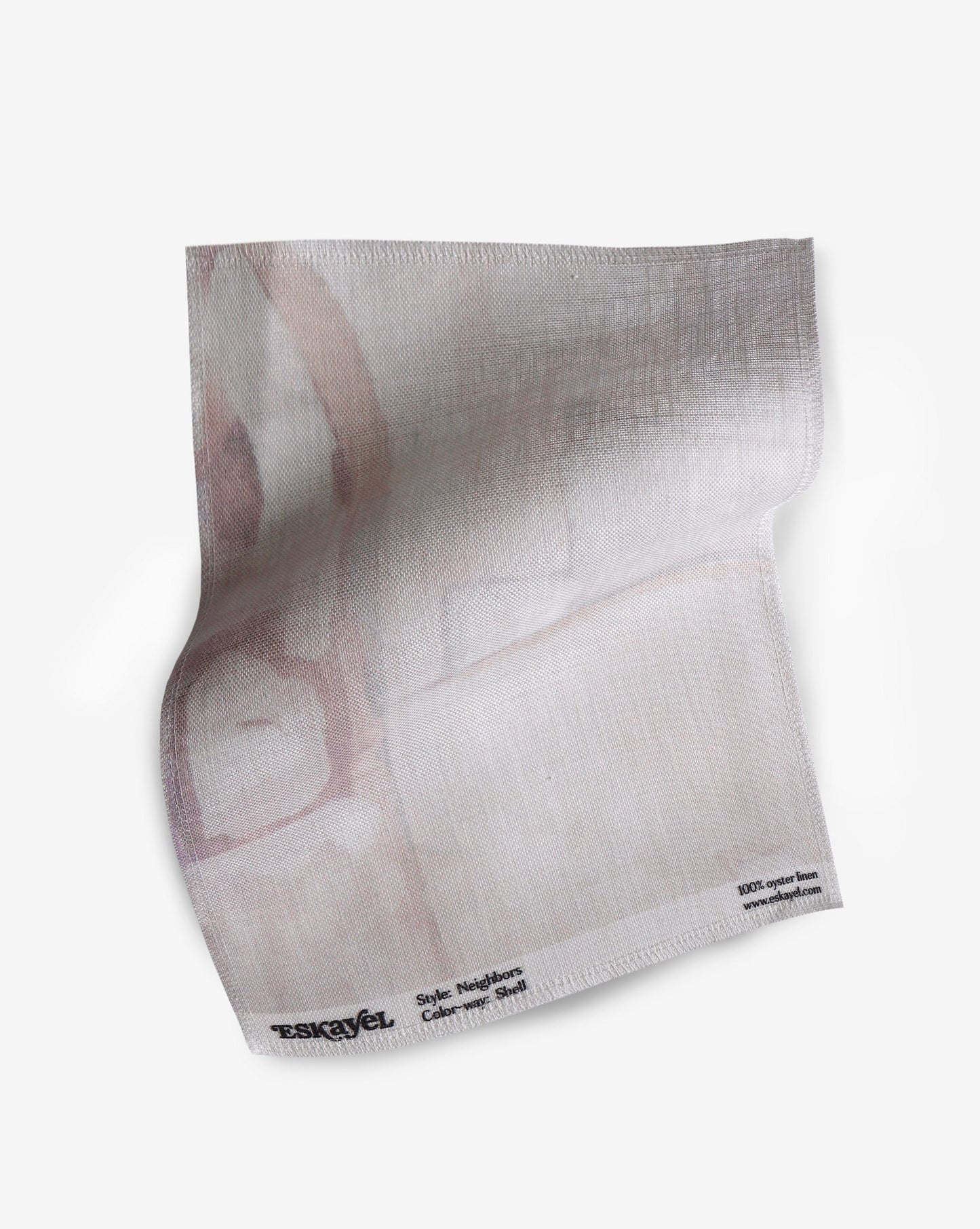 A fabric with our neighbors pattern featuring a design of abstract shapes in pink and white.