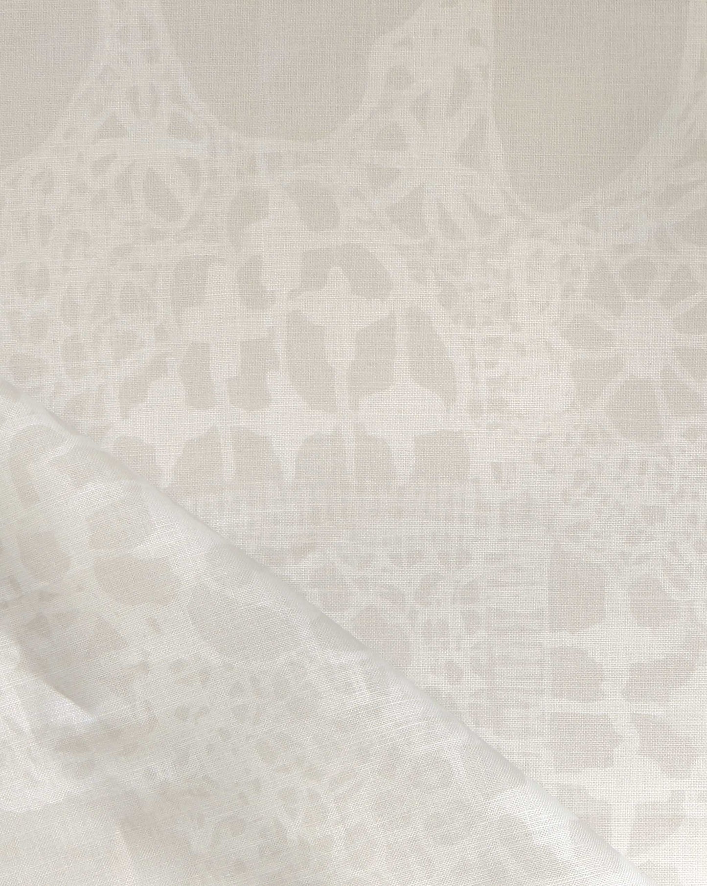 Ricotta Nonna’s Lace from Eskayel is a large-scale, non-repeating fabric of neutral creams. 