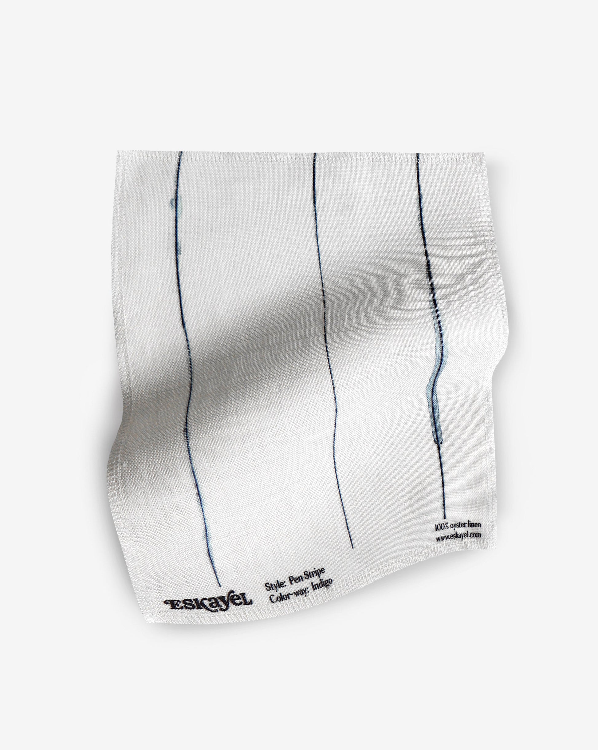A fabric with our pen stripe pattern featuring a conventional pinstripe design of straight inky lines in navy blue and white.