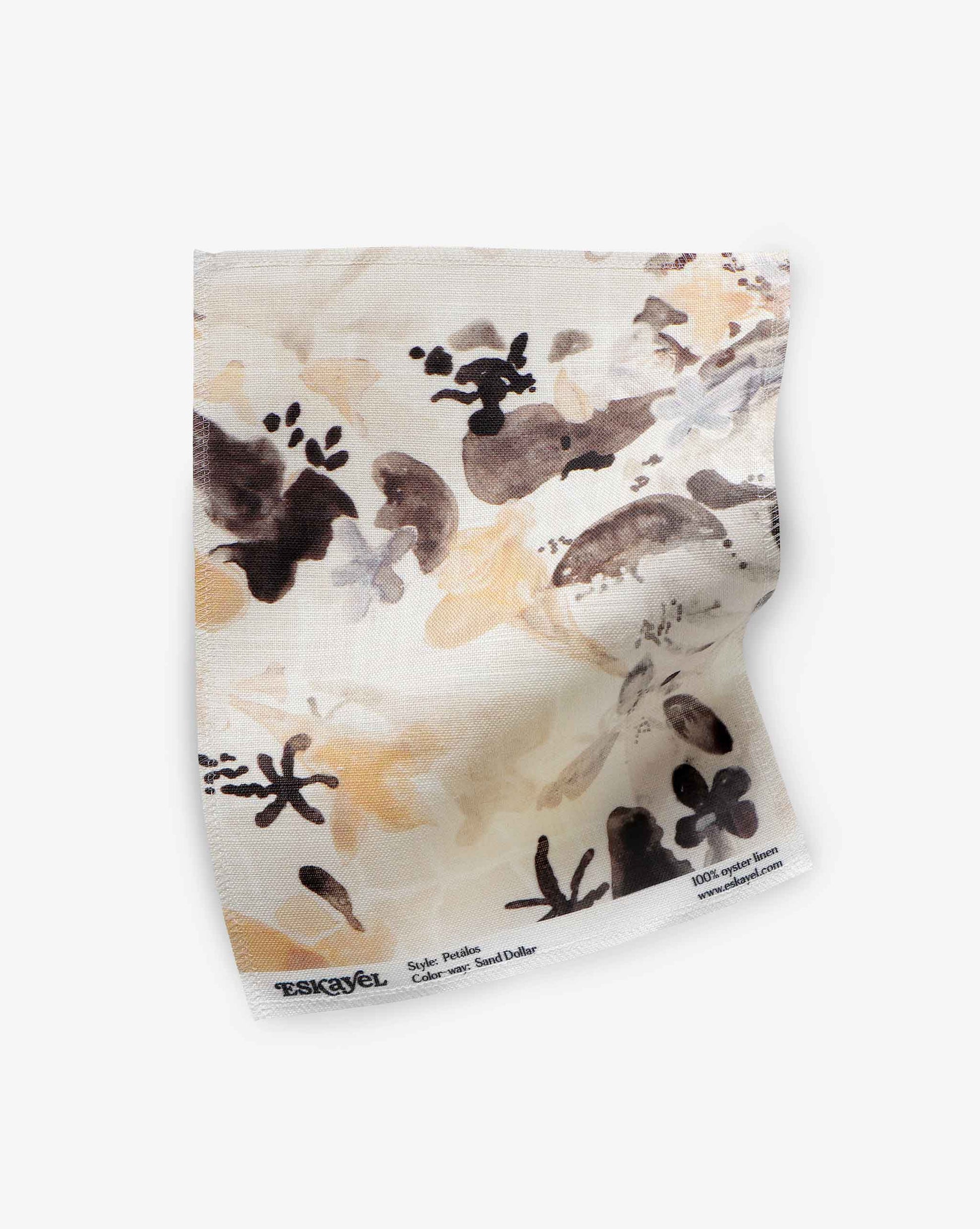 A fabric swatch of our Pétalos pattern in the color way sand dollar with a palette of pearl, cream, and oyster tones.