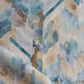 Sorisa fabric is a rich chevron pattern, while the Sage colorway is made up of a spectrum of blues and greens