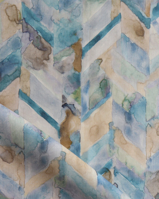 Sorisa fabric is a rich chevron pattern, while the Sage colorway is made up of a spectrum of blues and greens. 
