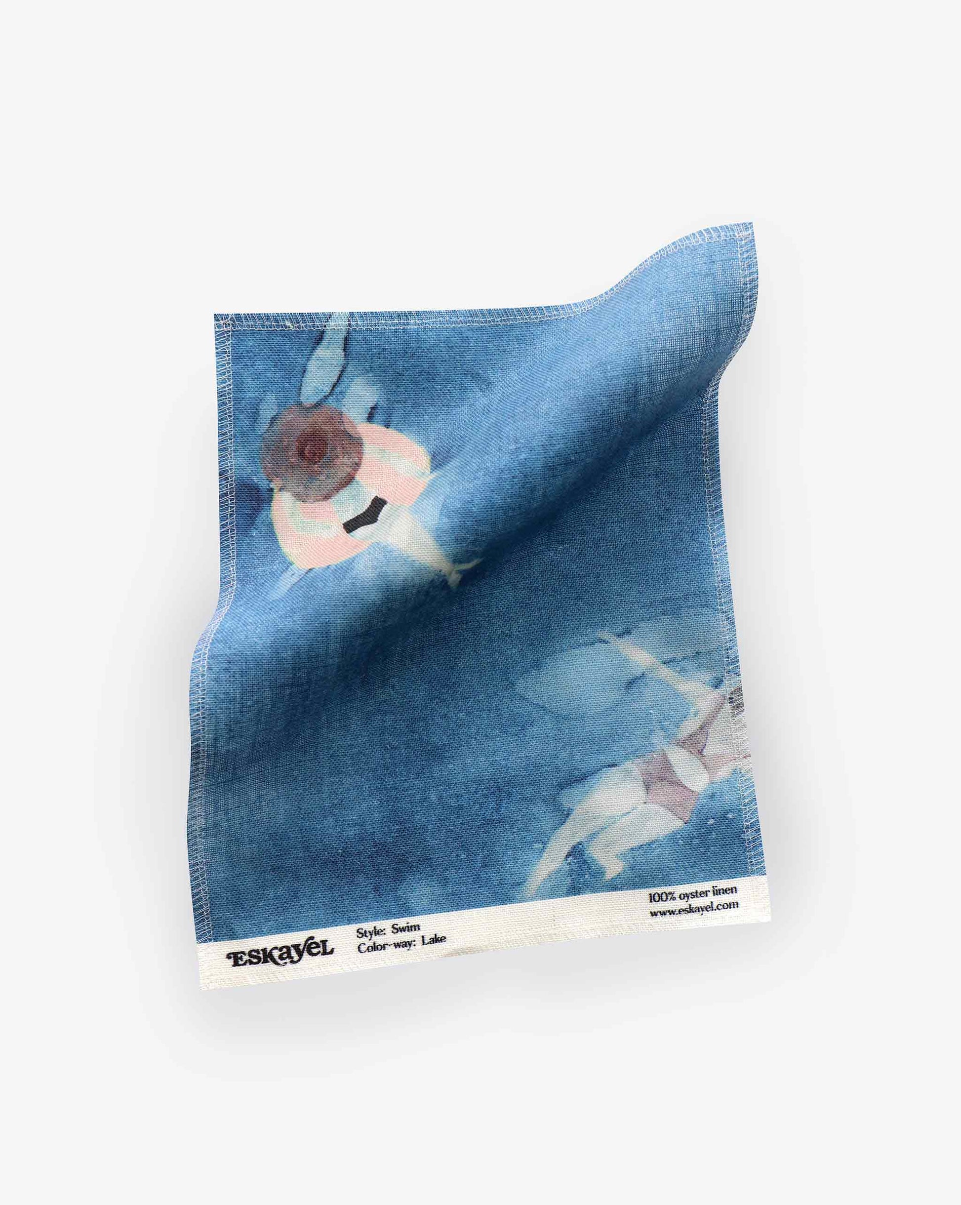 A square Swim Fabric Sample||Lake swatch with a floral design in blue tones, displaying product details such as style and fabric composition along the edge, includes an "Order Sample" option for customer convenience.