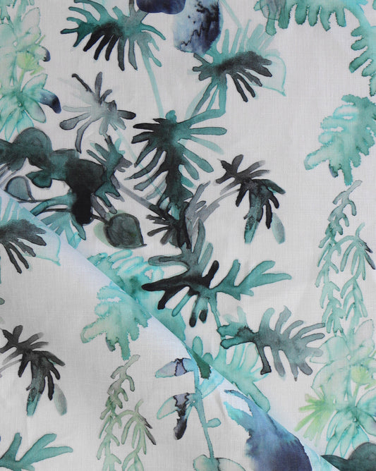 Luxury Topiary fabric in the Spruce colorway features botanical imagery in turquoise, blue, and green.