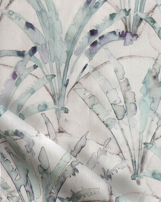 A blue and white Travelers Palm Fabric||Dusk, perfect for luxury fabric enthusiasts.