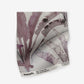 A luxury Travelers Palm Fabric hand fabric with a purple and white pattern on it